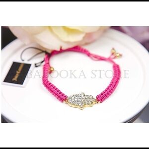 Juicy Couture Pave Hamsa Hand Friendship Bracelet.